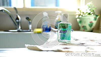 Purell hand sanitizer bottle on a kitchen counter. Editorial Stock Photo