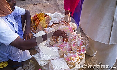 Man selling sweets and Prasad of Lord Jagannath Editorial Stock Photo