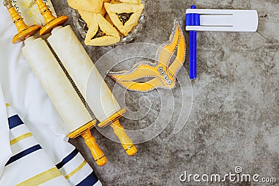 Purim celebration jewish holiday carnival with happy decoration a hamantaschen cookies shofar tallit Stock Photo