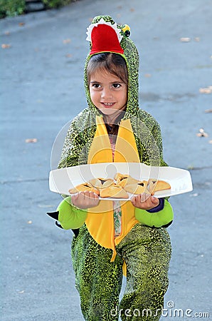 Purim Jewish Holiday - Child carry Mishloach Manot Stock Photo