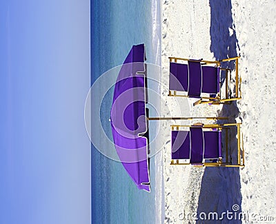 Purple Beach Chairs And Umbrella Royalty Free Stock Photography - Image