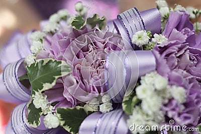 Purple Bridal Bouquet Close up With Purple Flowers and Lily of the Valley Stock Photo