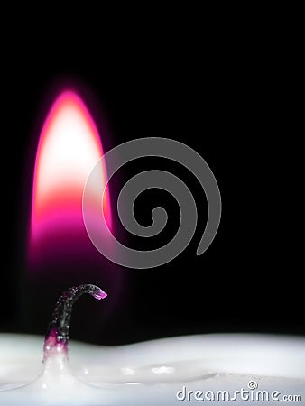 Purple candle flame Stock Photo