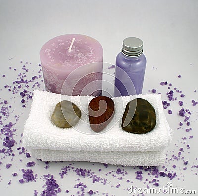 Purple Candle and Massage Oil Stock Photo