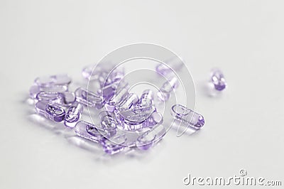 Purple Capsule pills Stock Photo