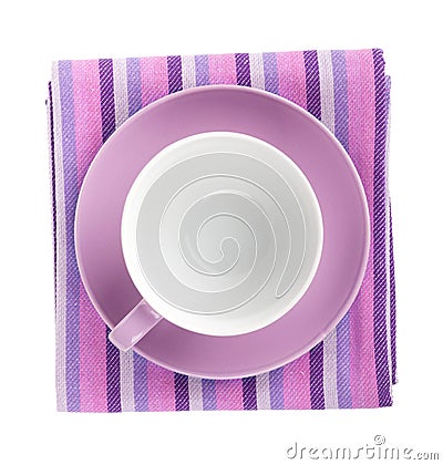 Purple coffee cup over kitchen towel Stock Photo