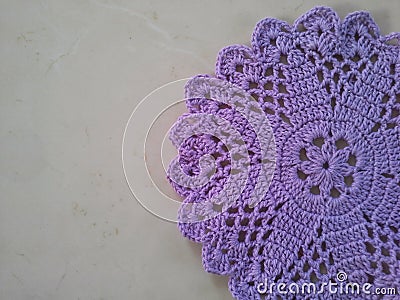 Purple crochet doily Stock Photo