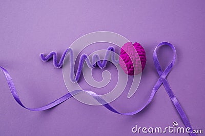 Purple day. Epilepsy awareness day. Awareness Purple ribbon Stock Photo