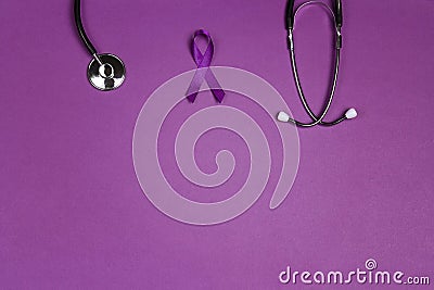 Purple epilepsy awareness ribbon with stethoscope and copy space on a purple background Stock Photo