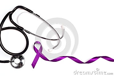 Purple epilepsy awareness ribbon with stethoscope and copy space on a white background. World epilepsy day Stock Photo