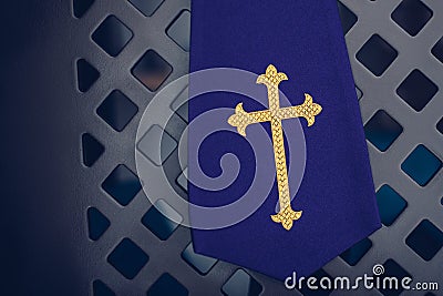 Purple fabric stole in confessional in church Stock Photo