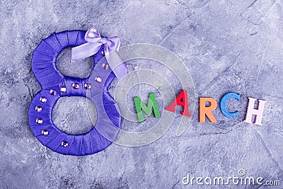 Purple figure eight and word march Stock Photo