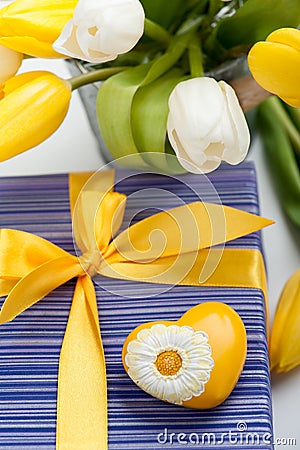 Purple gift box with yellow heart Stock Photo