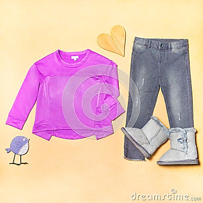 Purple girl top cloth with a jeans pants Stock Photo