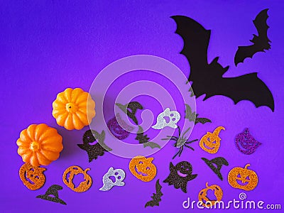 Purple Halloween background with decorative ghosts, pumpkins, spiders, bats. Happy Halloween Stock Photo