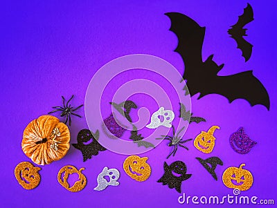 Purple Halloween background with decorative ghosts, pumpkins, spiders, bats. Happy Halloween Stock Photo