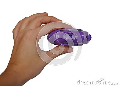 Purple inhaler in hand Stock Photo