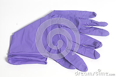 Purple latex gloves Stock Photo