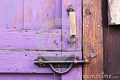 Purple Painted Dutch Split Shed Door`s Gate Lock and Iron Handle Stock Photo