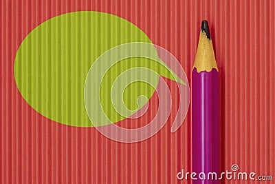 Purple pencil on with green speech bubble Stock Photo