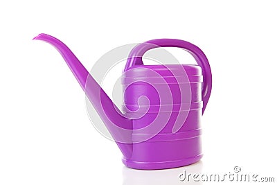 Purple plastic watering can Stock Photo
