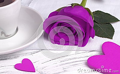 Purple rose and heart shape on white wood background, valentine`s day concept, love symbol. Stock Photo