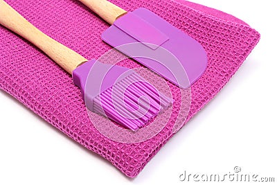 Purple silicone kitchen accessories on white background Stock Photo