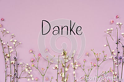 Purple Spring Flower Arrangement, German Text Danke Means Thank You Stock Photo