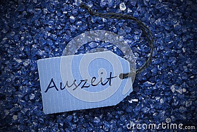 Purple Stones With Label Auszeit Means Downtime Stock Photo