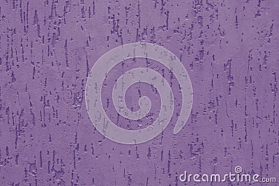 Purple stucco with embossed backdrop on concrete wall. Abstract violet pattern on the ribbed wall. Painted violaceous textured sur Stock Photo