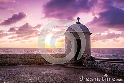 Purple Sunset over Defensive Wall - Cartagena de Indias, Colombia Stock Photo