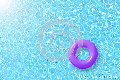 Purple swimming pool ring float in blue water and sun bright. Stock Photo