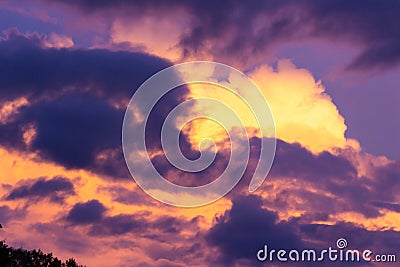 Purple and yellow cloudy sky Stock Photo