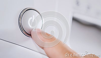 Push button on washing machine Stock Photo