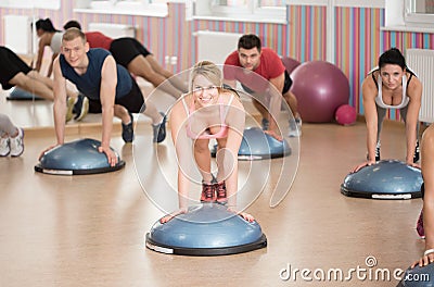 Push-ups on bosu Stock Photo