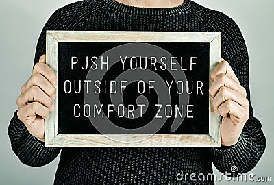 Push yourself outside of your comfort zone Stock Photo