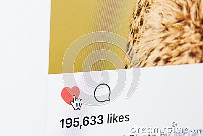 Pushing like button in instagram Editorial Stock Photo