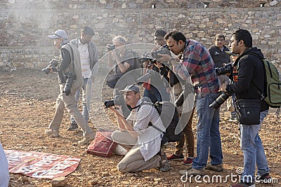 Photographer take pictures at the Pushkar Camel Mela, Pushkar Camel Fair, India. Many photographers from around the world come to Editorial Stock Photo