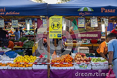 Putrajaya, Malaysia - October 16, 2020: The fresh market in Putrajaya, near the capital Kuala Lumpur, is busy. A sign with Editorial Stock Photo