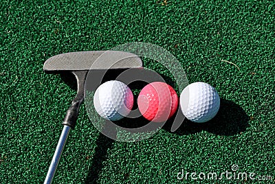 Putter and balls Stock Photo