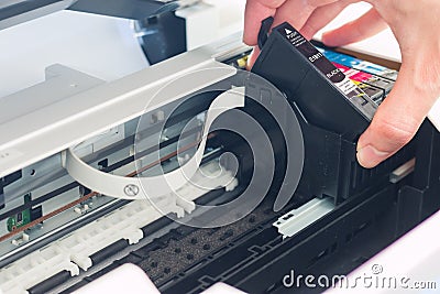 Refilling third party printer cartridges; inkjet Stock Photo