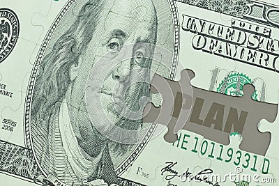 Puzzle with the dollar banknote and the text plan. Stock Photo