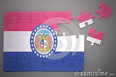 Puzzle with the flag of missouri state Stock Photo