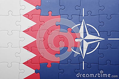 Puzzle with the national flag of bahrain and nato Editorial Stock Photo