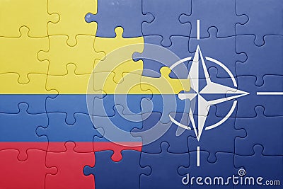 Puzzle with the national flag of colombia and nato Editorial Stock Photo