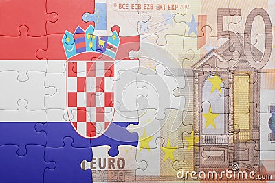 Puzzle with the national flag of croatia and euro banknote Stock Photo