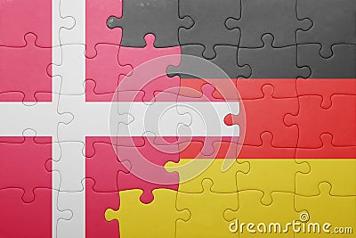 Puzzle with the national flag of denmark and germany Stock Photo