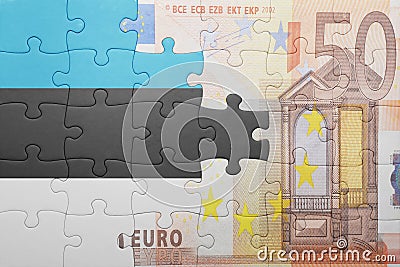 Puzzle with the national flag of estonia and euro banknote Stock Photo