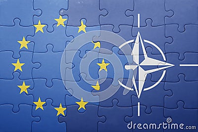 Puzzle with the national flag of european union and nato Stock Photo