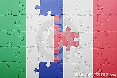 Puzzle with the national flag of italy and france Stock Photo